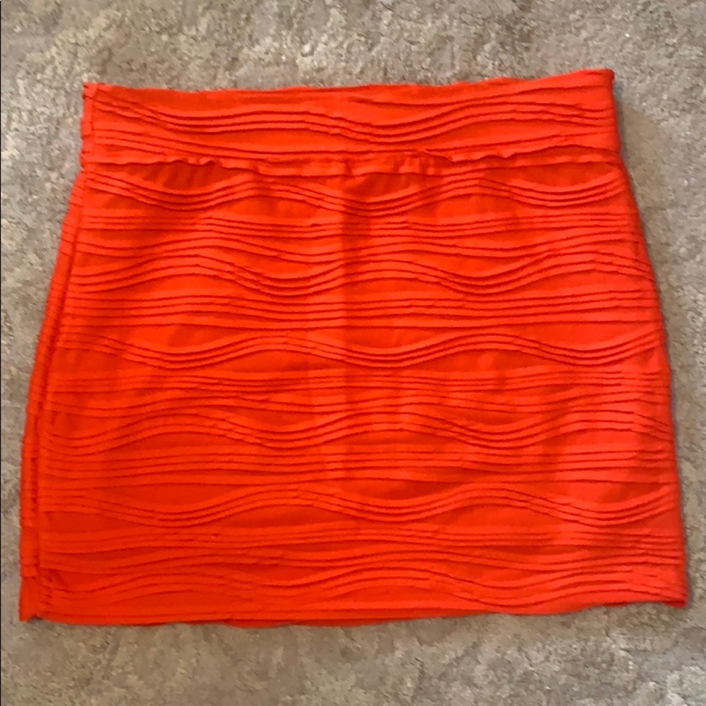 Orange mini skirt with wave like design